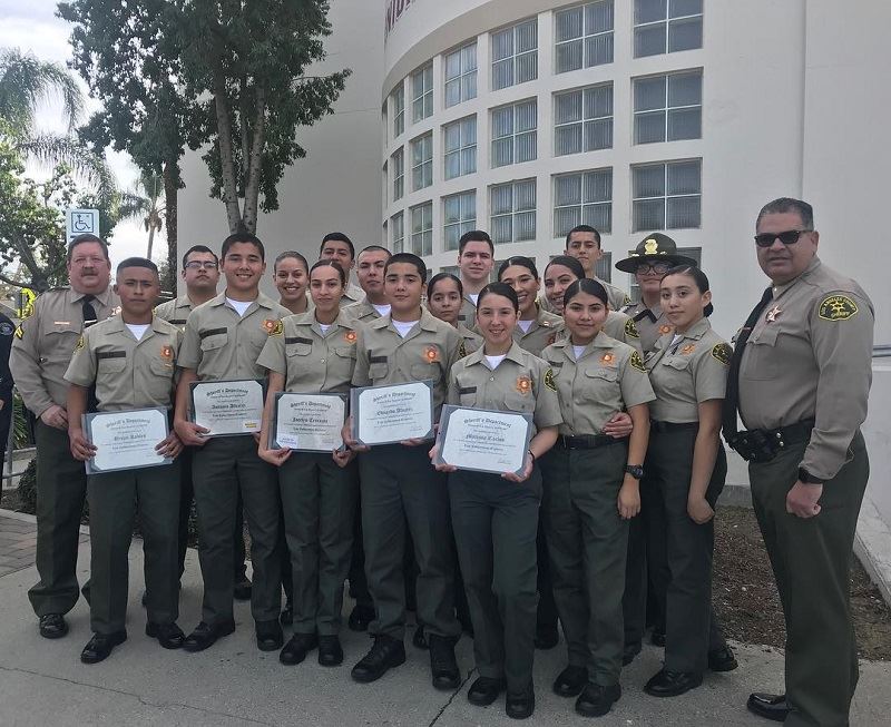 Sheriff Cadets Receiving Certificates From Officers